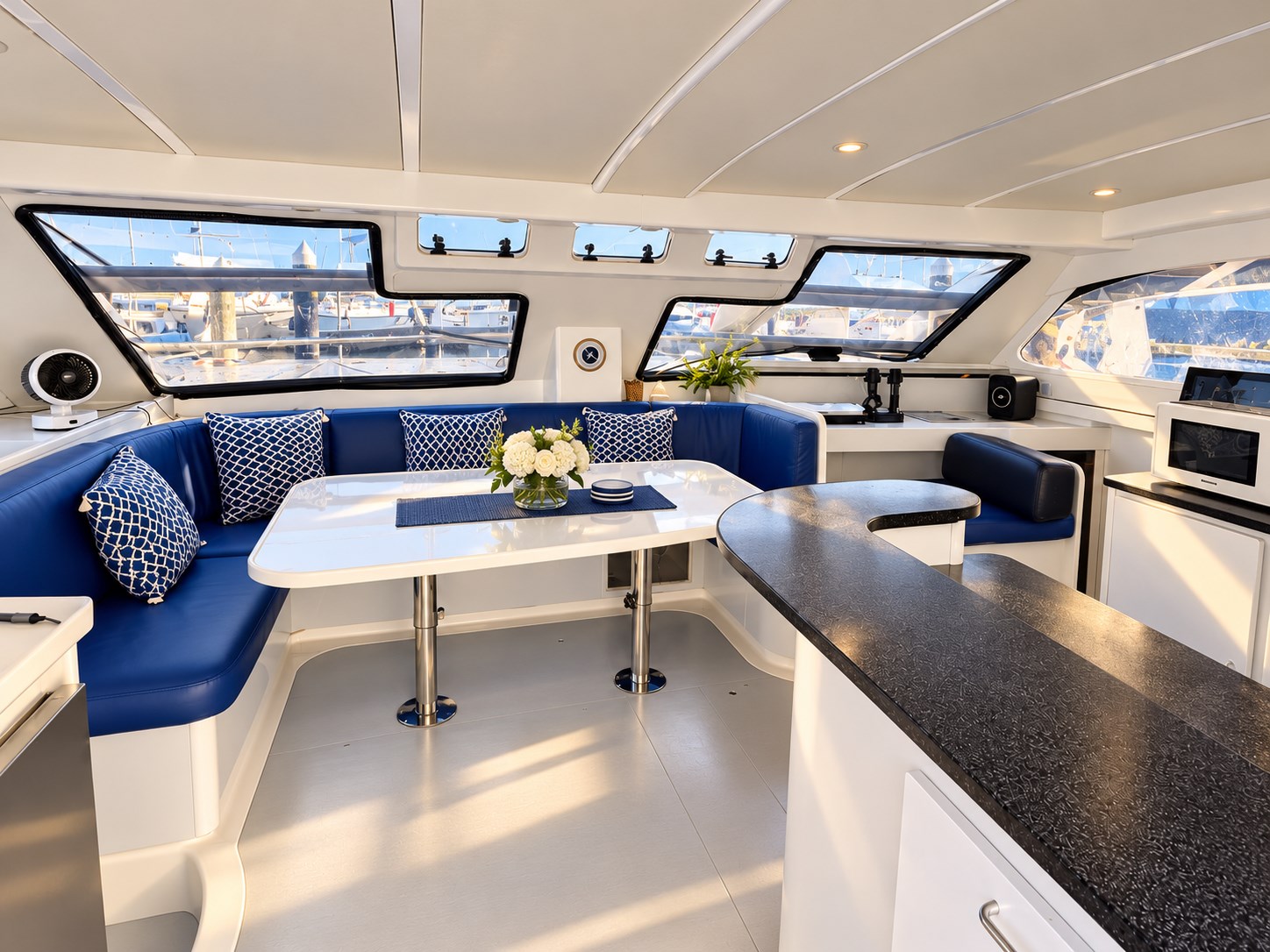 One Lotus spacious saloon with blue lounge seating